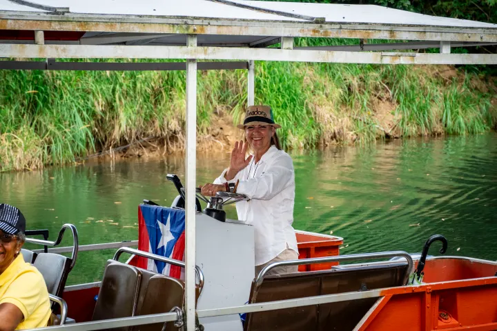 a man riding on the back of a boat